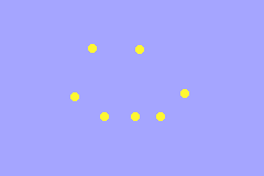 Yellow sprites arranged in a crude smiley face